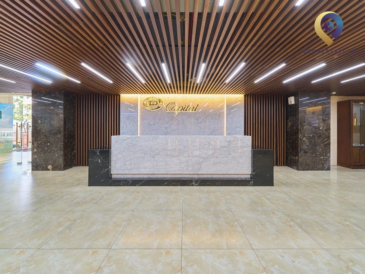 Reception desk area of Capital Building with modern design and marble finish - hình ảnh từ Property Plus